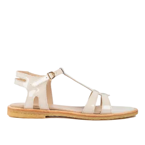Feminine sandal with strap design